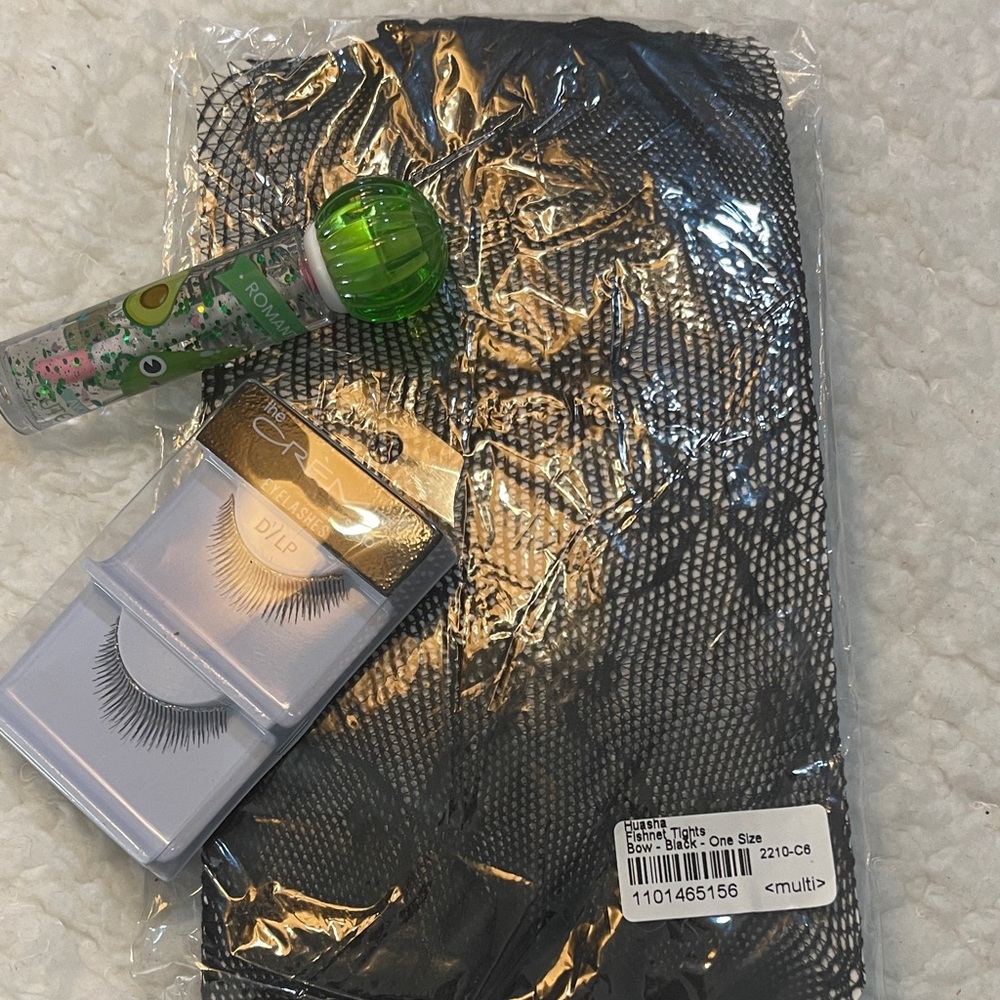 The Creme Shop Eyelashes Set fishnet hose and lip gloss